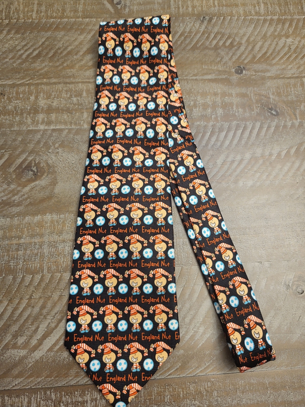 Vintage Bubblegum Black Tie with Orange and Blue Cartoon Pattern